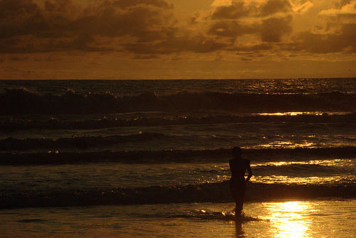 Woman sunset ocean
